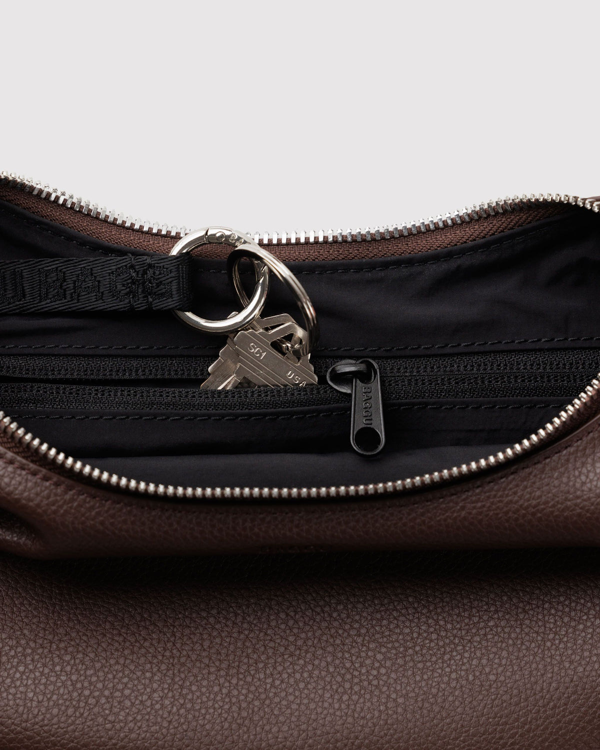 SMALL RECYCLED LEATHER FLAT CRESCENT - US 6660